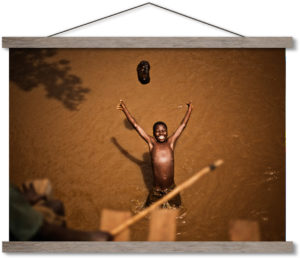 Boy in Burundi Swimming